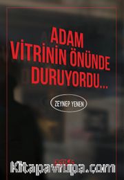 Adam Vitrinin Önünde Duruyordu